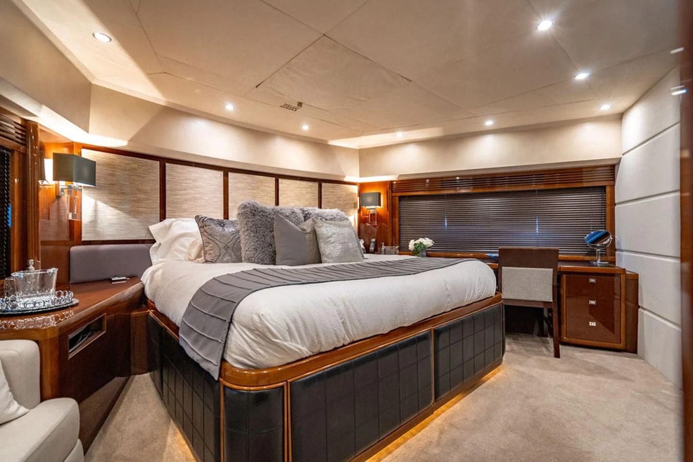 The master stateroom offers a luxurious and spacious retreat with elegant furnishings and ambient lighting. aboard OASIS Yacht for Sale