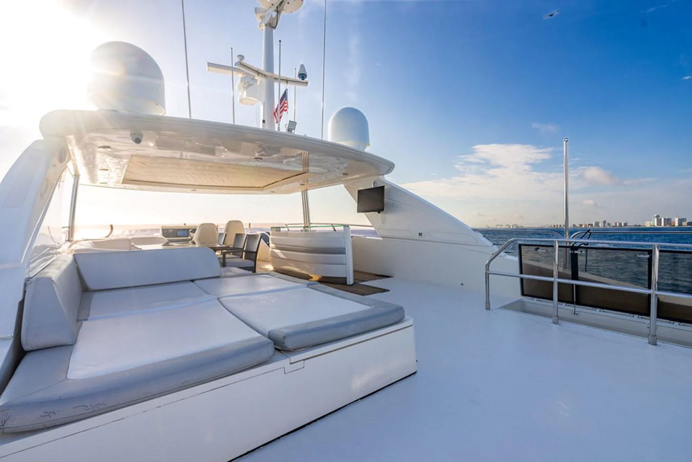 The sundeck offers luxurious lounging with panoramic ocean views. aboard OASIS Yacht for Sale