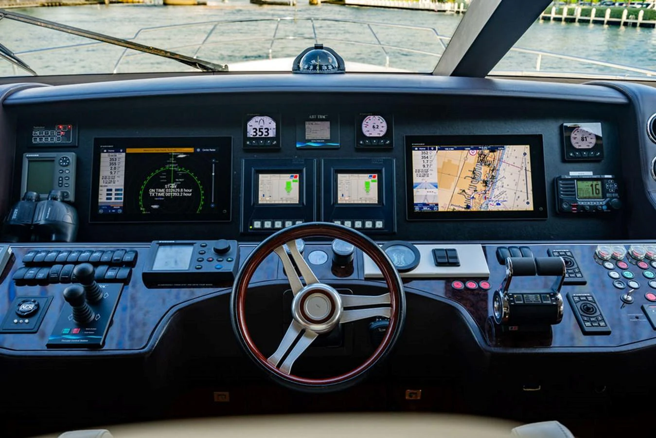 The helm station features advanced navigation and control systems for a seamless sailing experience. aboard OASIS Yacht for Sale