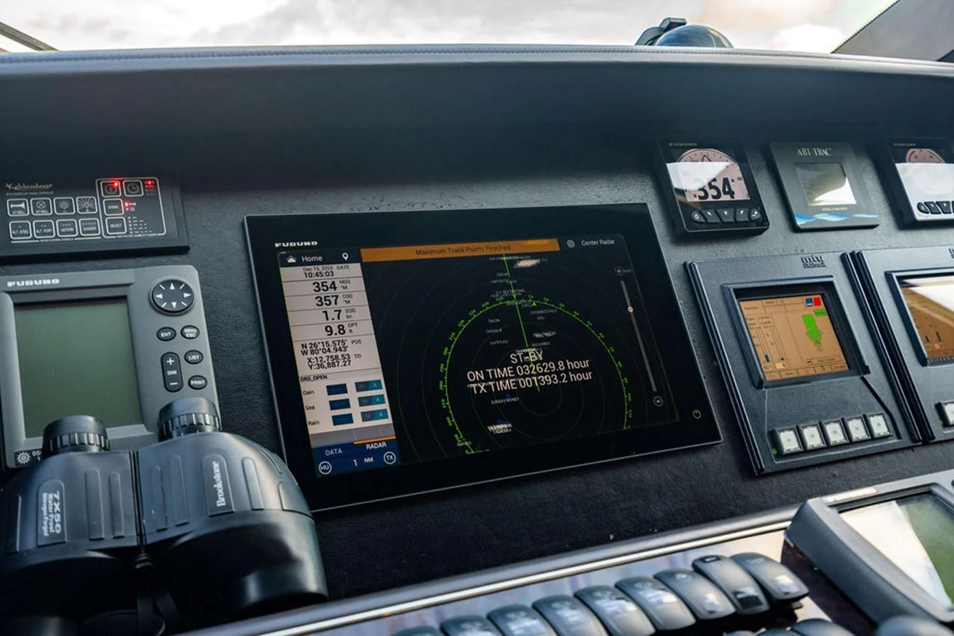 The helm features advanced navigation and control systems for precise yacht management. aboard OASIS Yacht for Sale