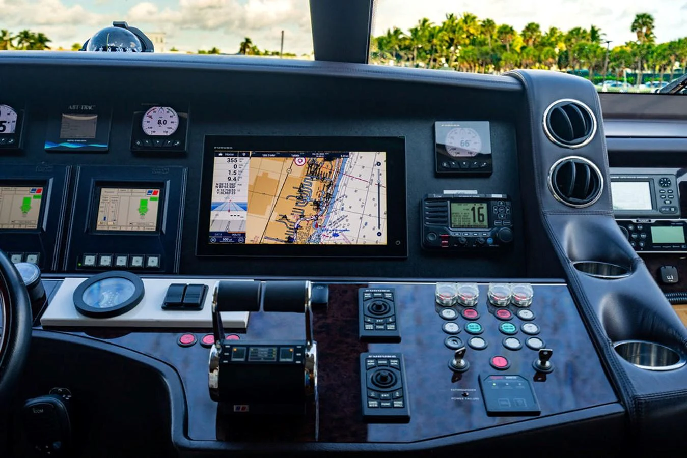 The helm features advanced navigation equipment and controls for a seamless sailing experience. aboard OASIS Yacht for Sale