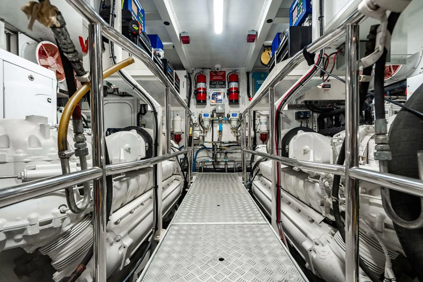 The image showcases the well-maintained engine room of the yacht, featuring advanced machinery and equipment. aboard OASIS Yacht for Sale
