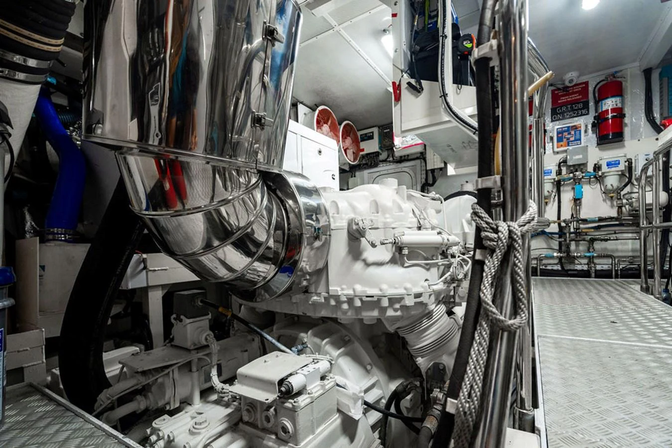 The image showcases the pristine and well-maintained engine room of the yacht, highlighting its advanced machinery and equipment. aboard OASIS Yacht for Sale