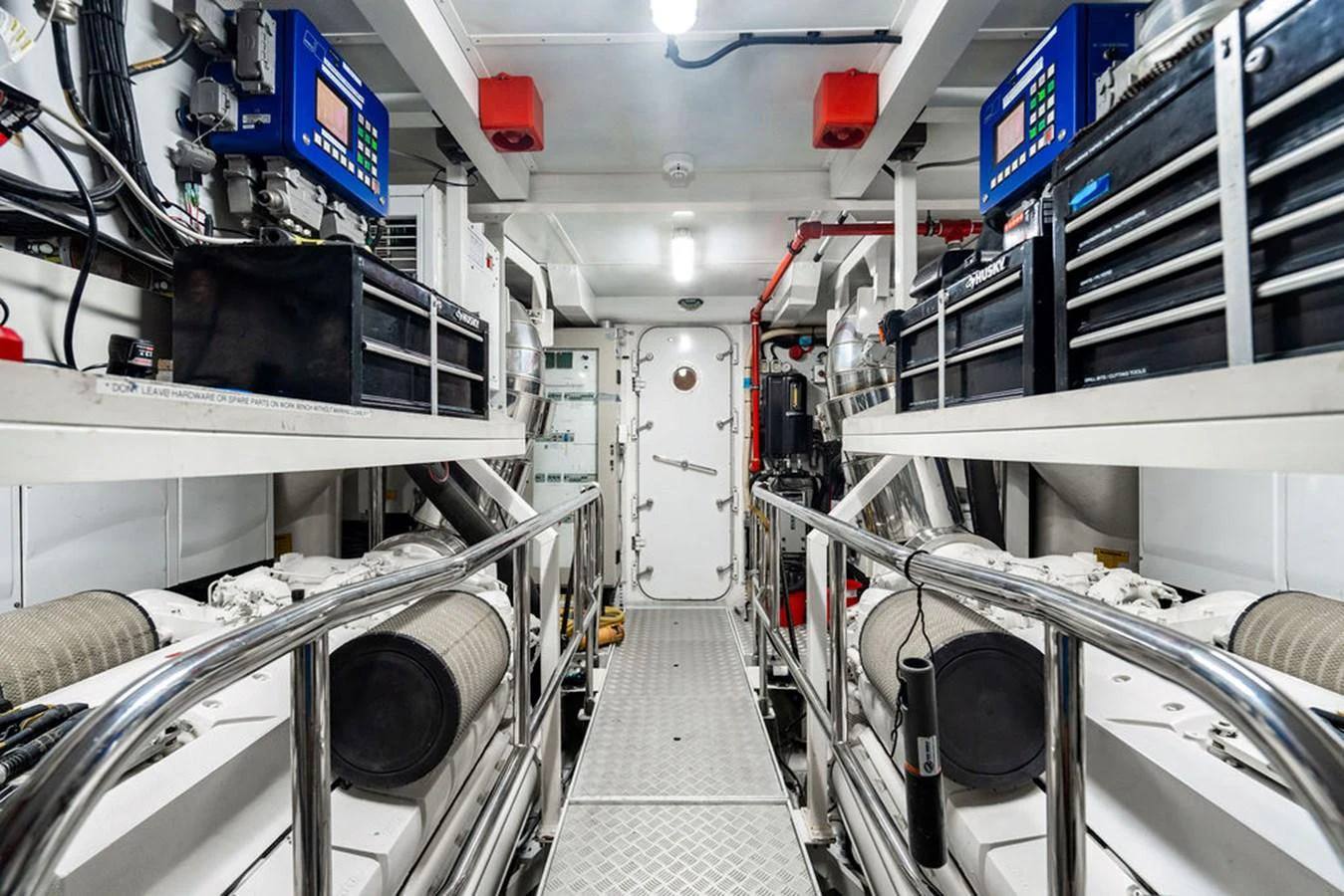 The engine room is meticulously organized with advanced equipment and clean, well-maintained machinery. aboard OASIS Yacht for Sale