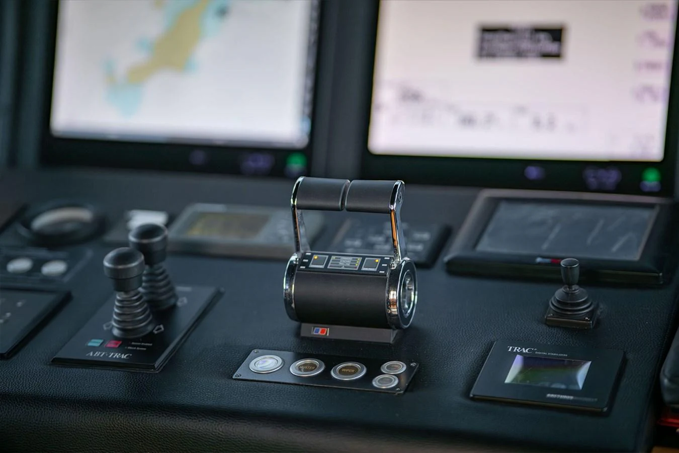 The helm station features advanced navigation and control systems for precise maneuvering. aboard FINAL CUT Yacht for Sale