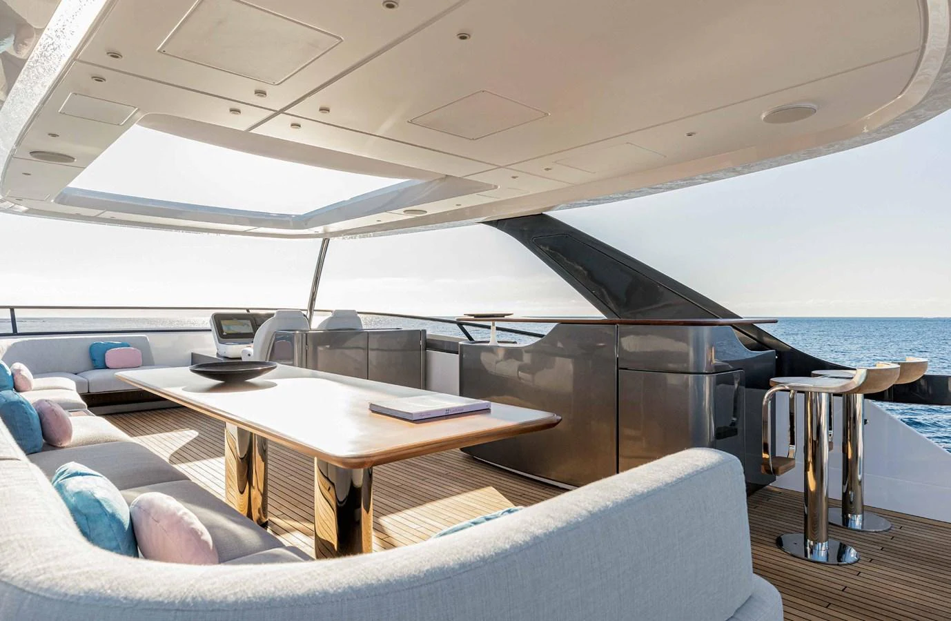 The flybridge offers a spacious and luxurious seating area with panoramic ocean views. aboard MARYBELLE Yacht for Sale