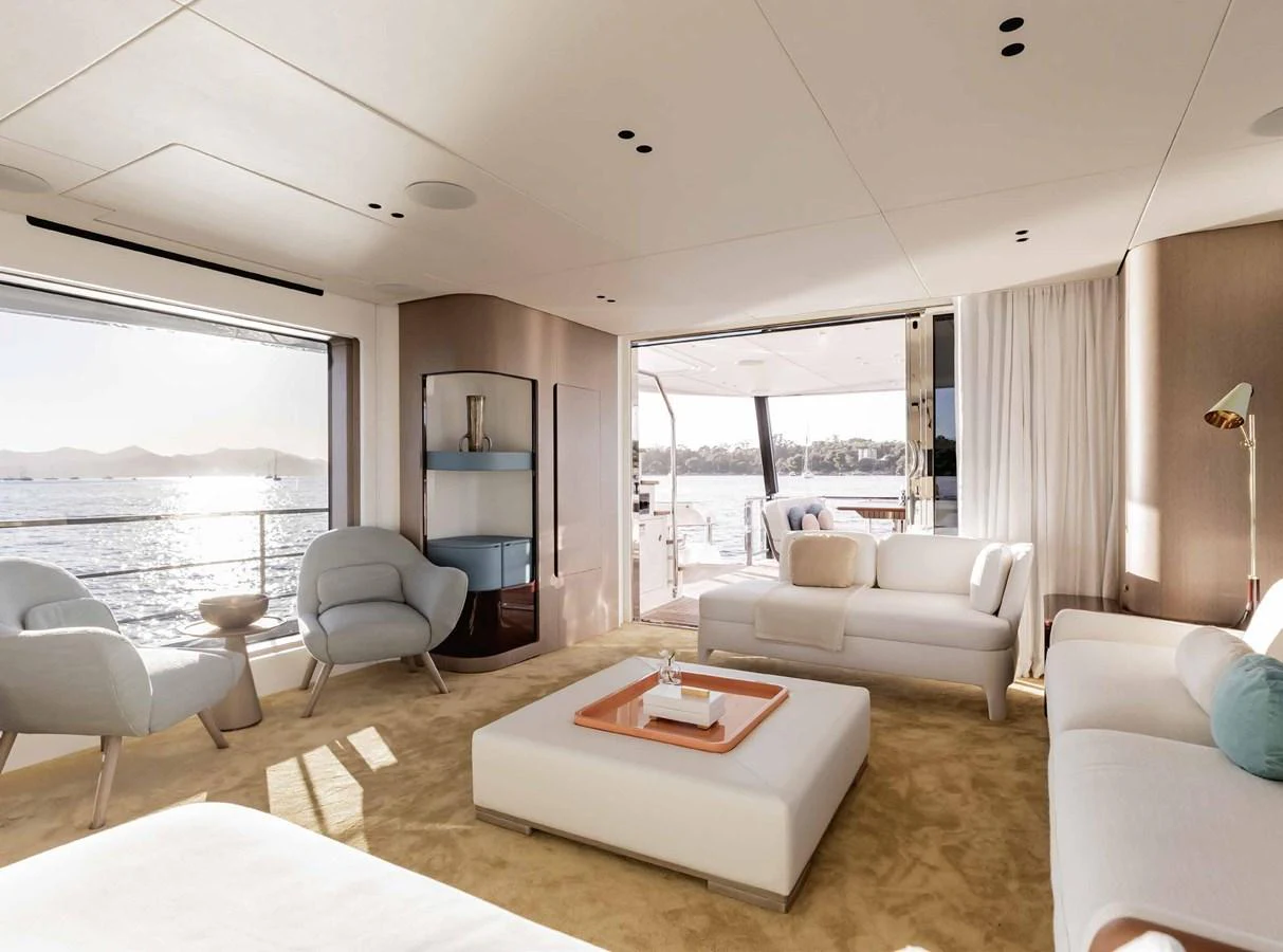 The salon offers a spacious and elegantly designed area with ample natural light and comfortable seating. aboard MARYBELLE Yacht for Sale