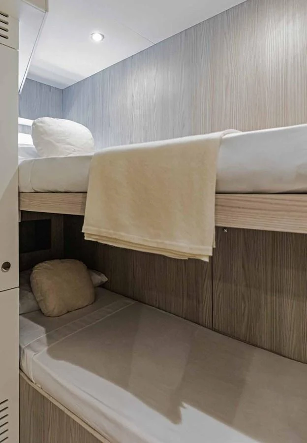The cozy bunk cabin offers a comfortable and efficient sleeping arrangement. aboard MARYBELLE Yacht for Sale