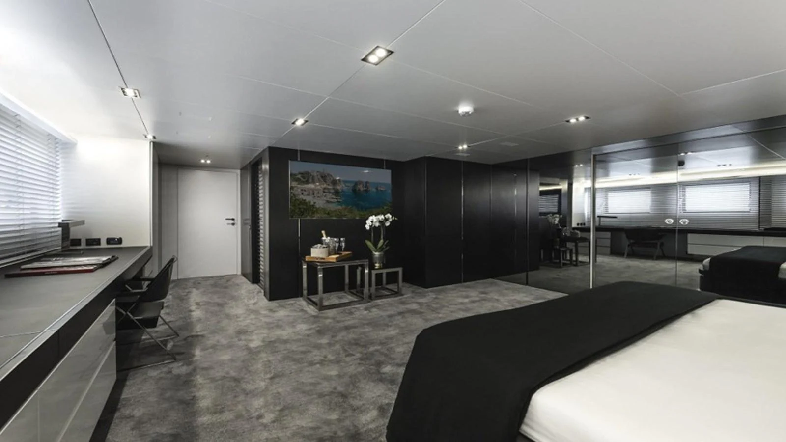 The master stateroom features a spacious layout with modern furnishings and luxurious amenities. aboard R23 Yacht for Sale