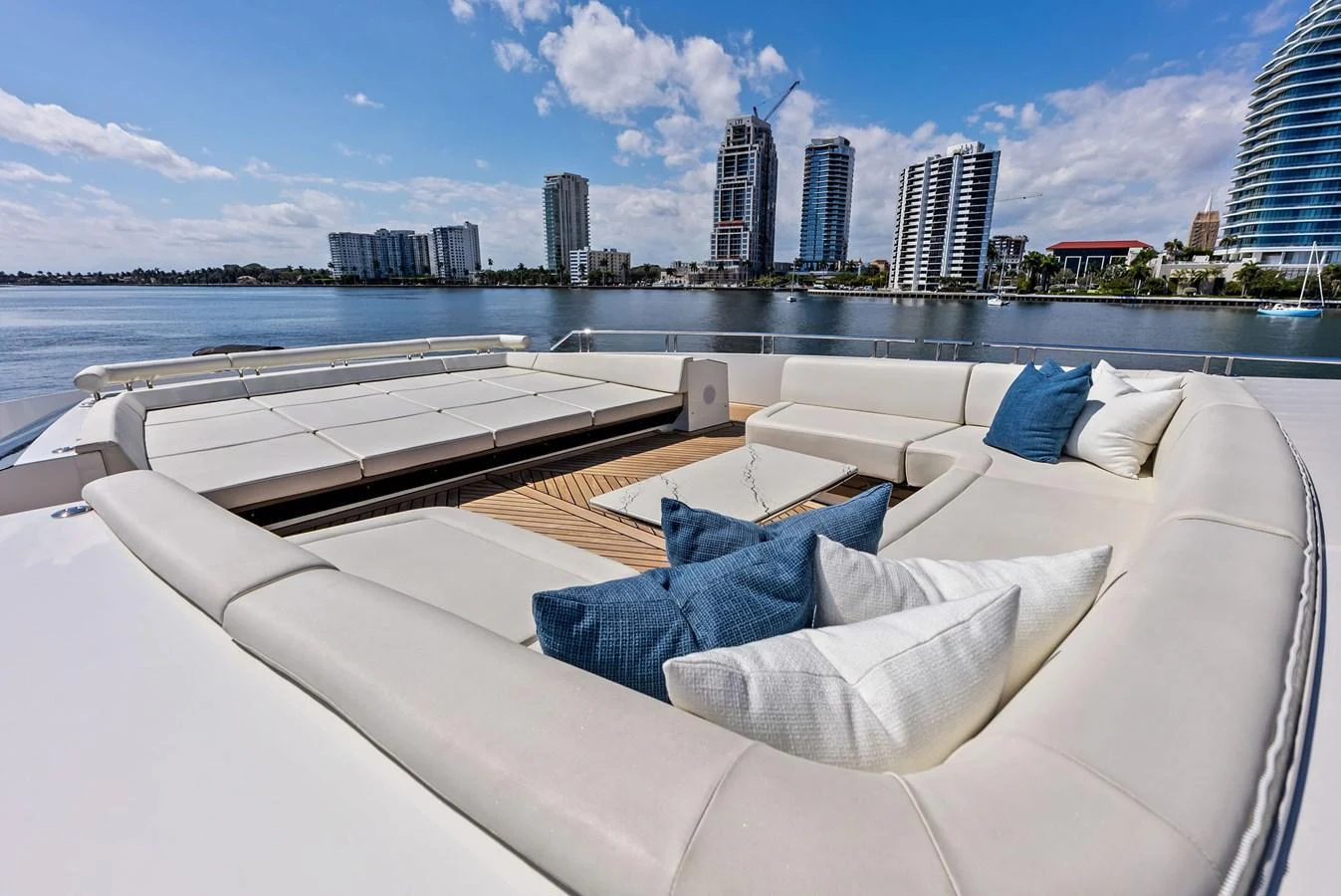 The sundeck offers a spacious lounging area with plush seating and scenic views. aboard SERENITY NOW Yacht for Sale