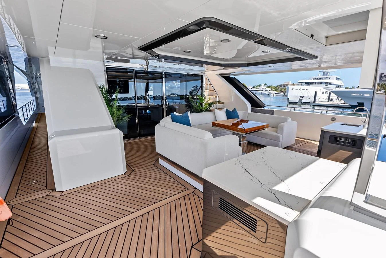 The aft deck features elegant seating with a modern design, perfect for relaxation and socializing. aboard SERENITY NOW Yacht for Sale