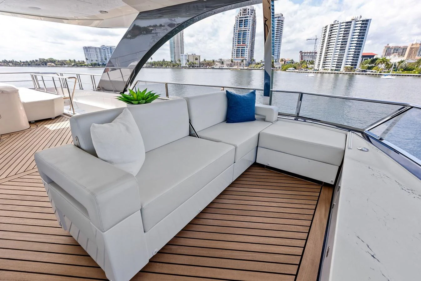 The aft deck features a comfortable seating area with a stunning view of the waterfront. aboard SERENITY NOW Yacht for Sale