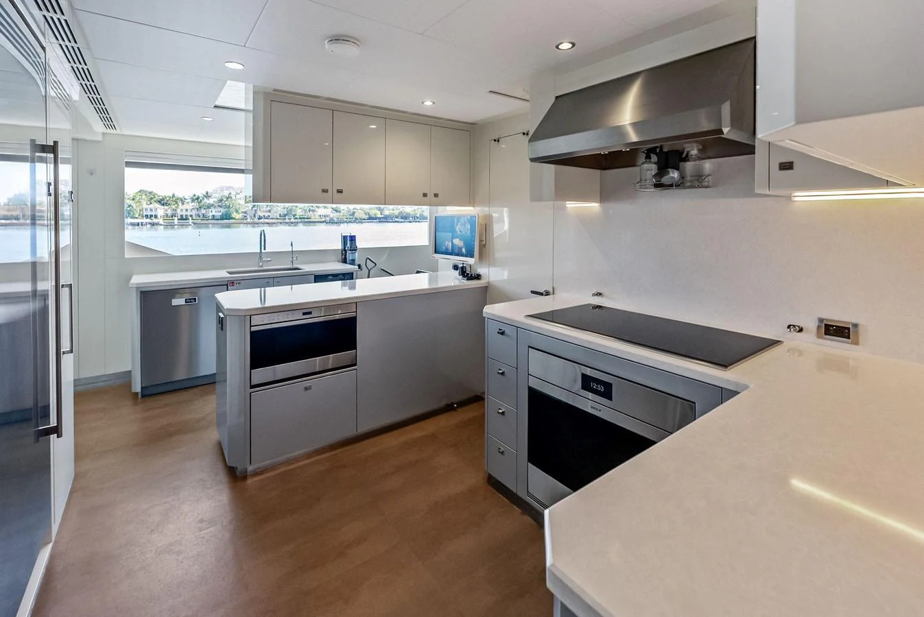 The galley is spacious and modern, featuring high-end appliances and ample counter space. aboard SERENITY NOW Yacht for Sale