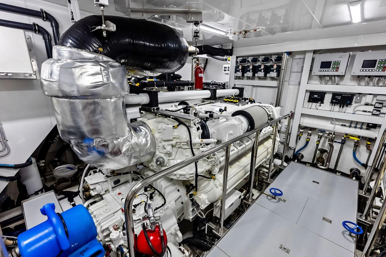 The image showcases the well-maintained engine room of the yacht, featuring advanced machinery and equipment. aboard SERENITY NOW Yacht for Sale