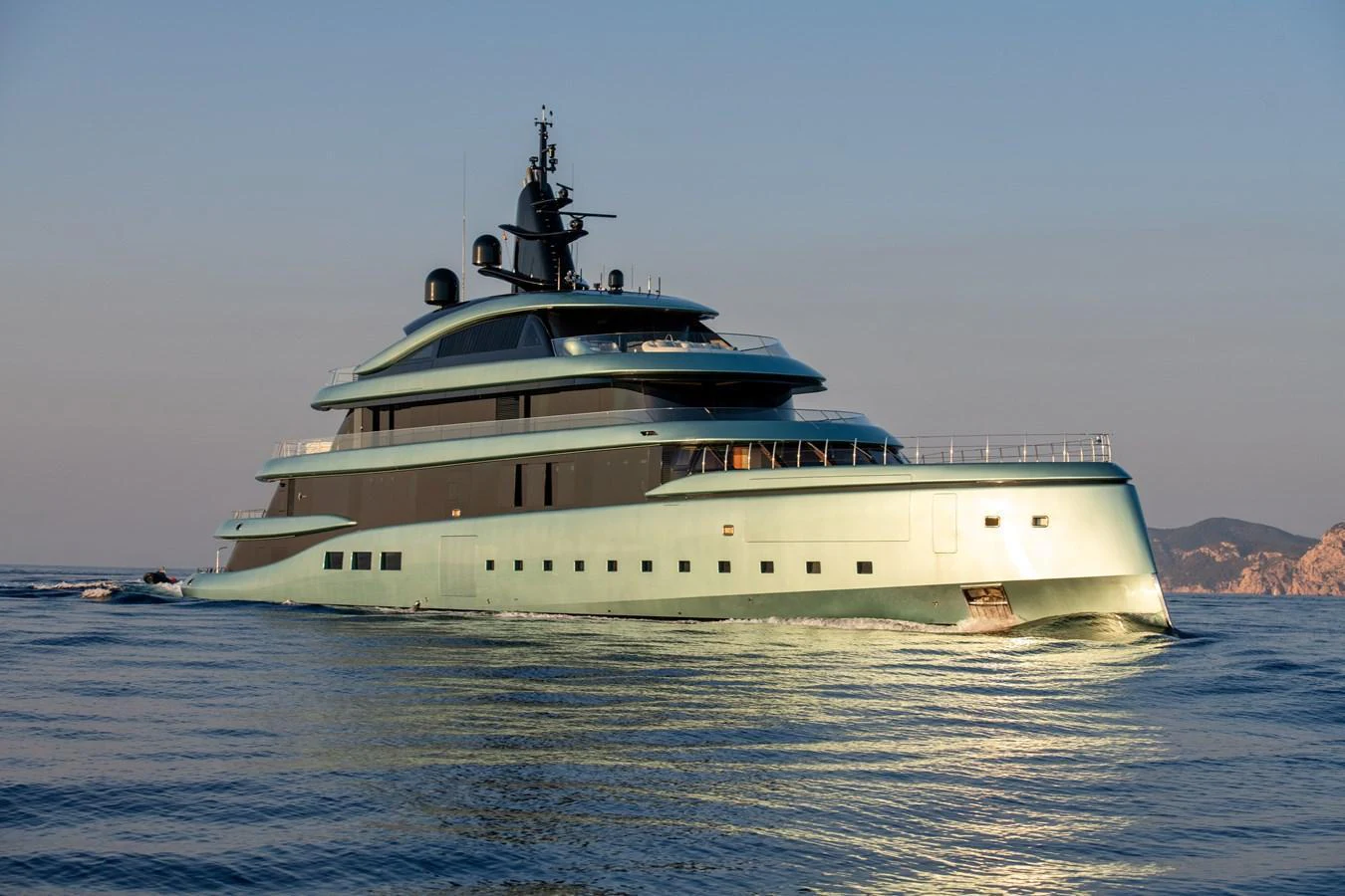A sleek and modern yacht glides gracefully on calm waters, showcasing its elegant design. aboard KENSHO Yacht for Sale