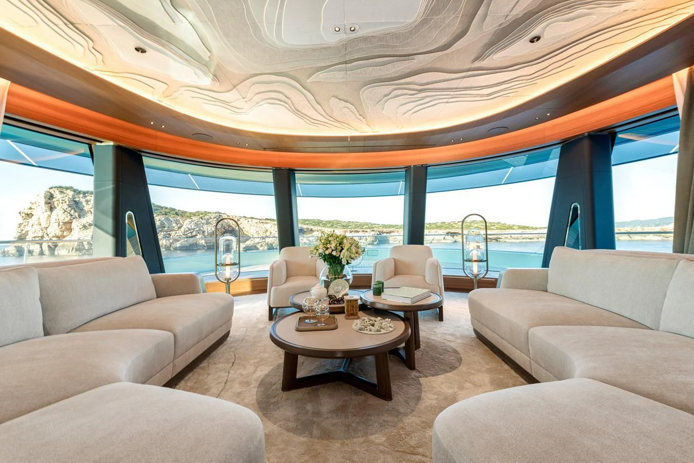 The salon offers a luxurious and spacious seating area with panoramic views of the surrounding waters. aboard KENSHO Yacht for Sale