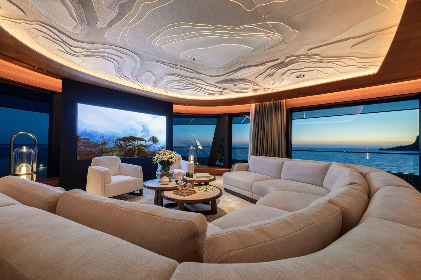 The yacht's salon features a spacious and elegant seating area with panoramic views. aboard KENSHO Yacht for Sale