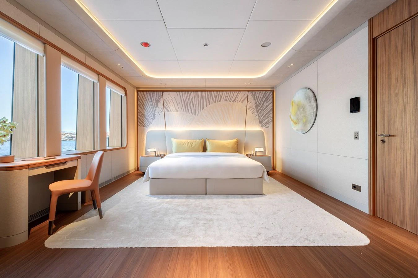 The master stateroom features a luxurious bed, elegant decor, and ample natural light. aboard KENSHO Yacht for Sale