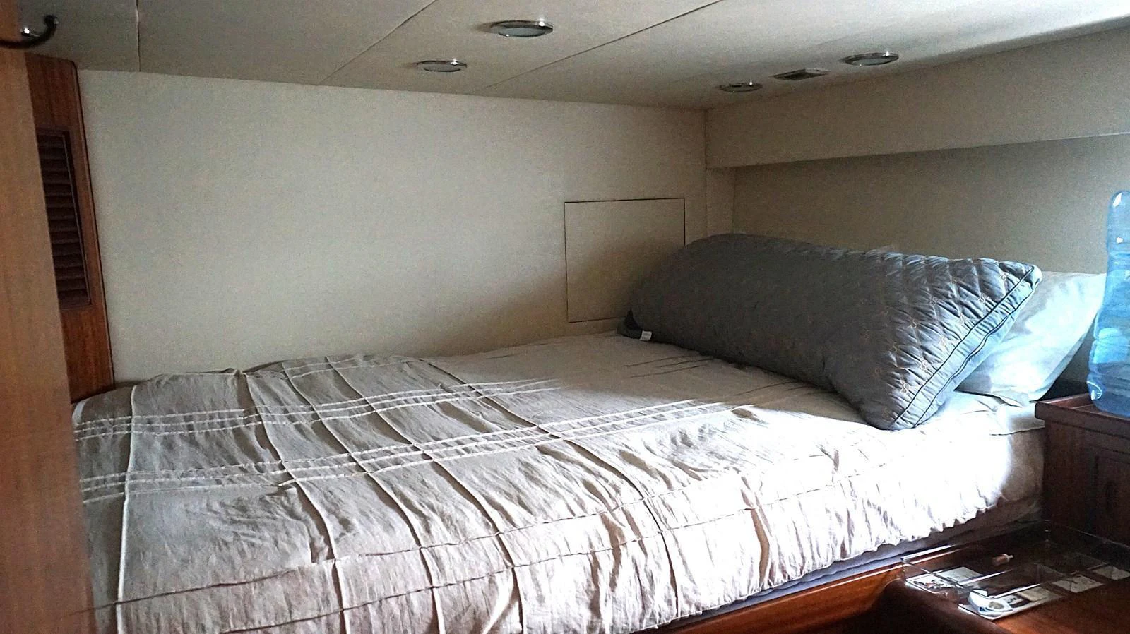 A cozy stateroom with a neatly made bed and soft lighting. aboard ROBIN'S NEST Yacht for Sale