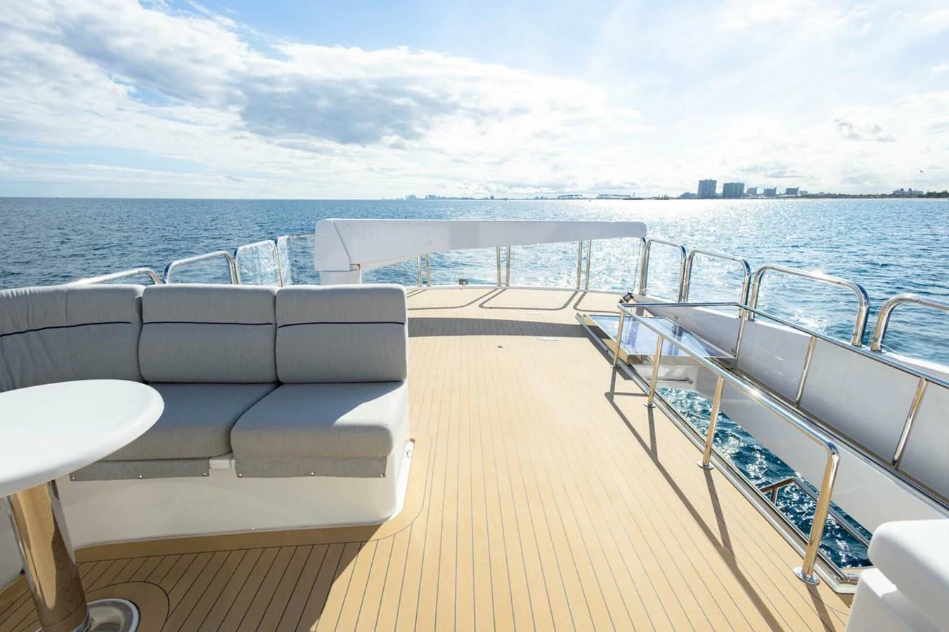 The aft deck offers a spacious and inviting area for relaxation with comfortable seating and stunning ocean views. aboard BOBBI TOO Yacht for Sale