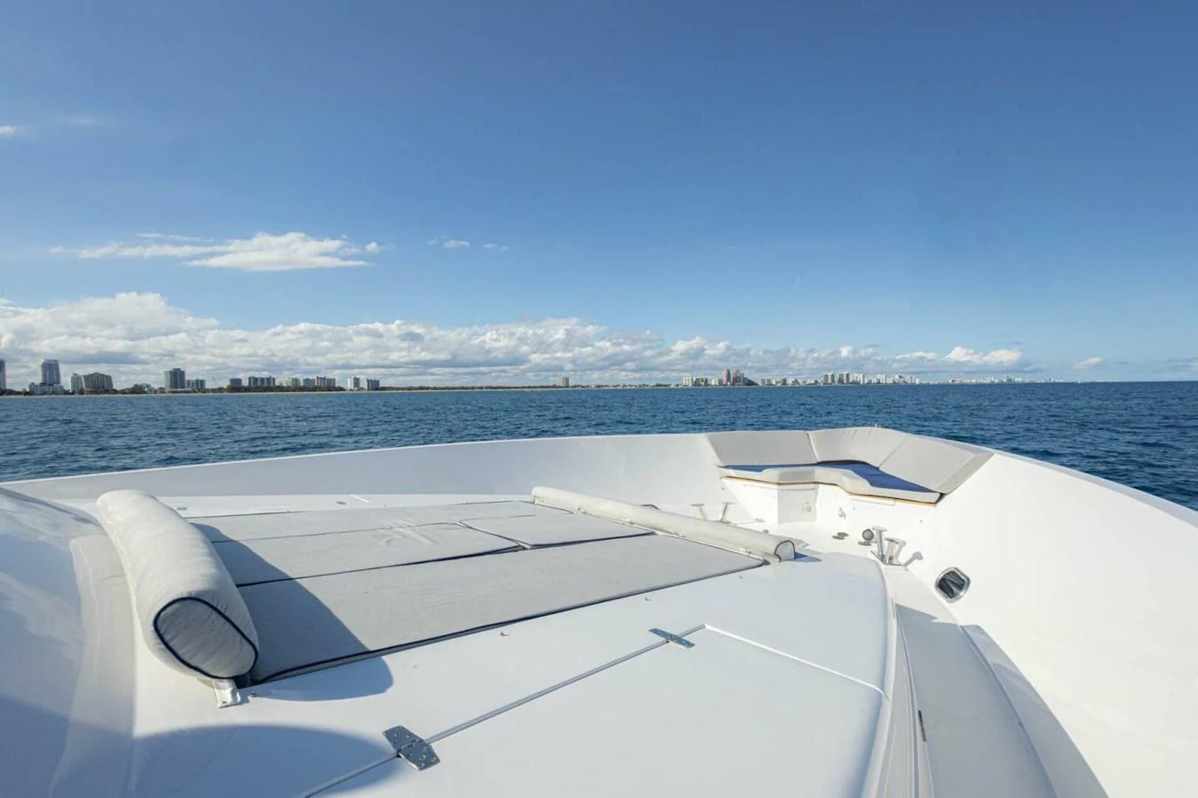 The yacht's foredeck offers a spacious sunbathing area with stunning ocean views. aboard BOBBI TOO Yacht for Sale
