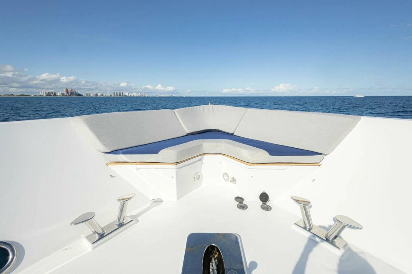 The bow of the yacht features a comfortable seating area with a stunning ocean view. aboard BOBBI TOO Yacht for Sale