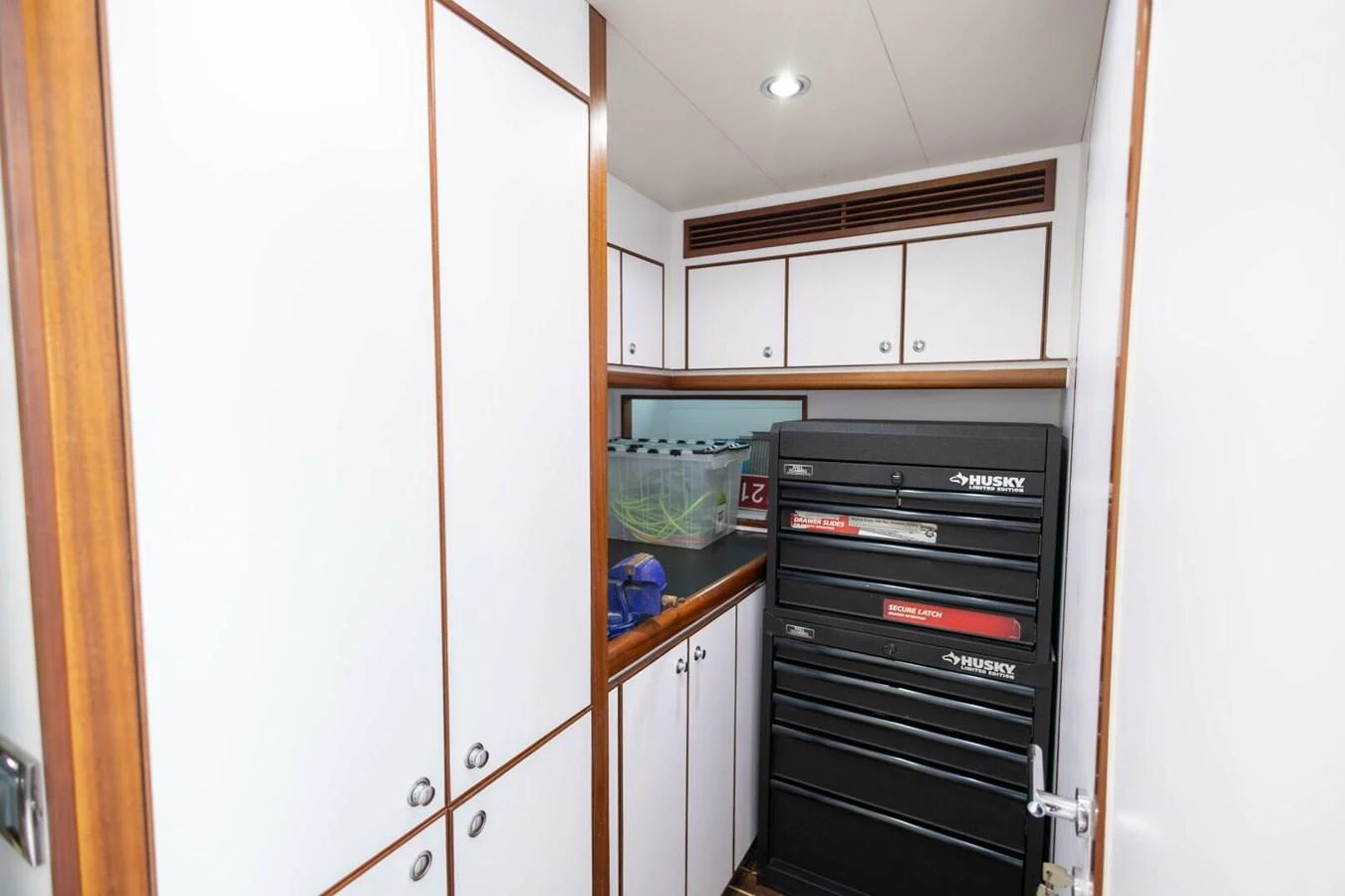 A well-organized storage room with ample cabinetry and a tool chest. aboard BOBBI TOO Yacht for Sale