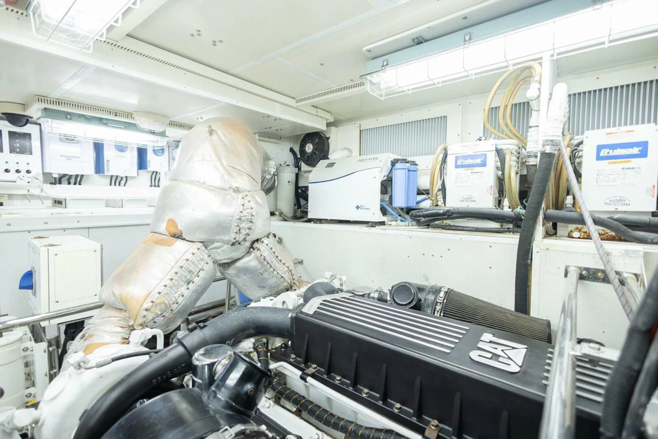 The engine room showcases powerful machinery and advanced equipment, ensuring optimal performance. aboard BOBBI TOO Yacht for Sale