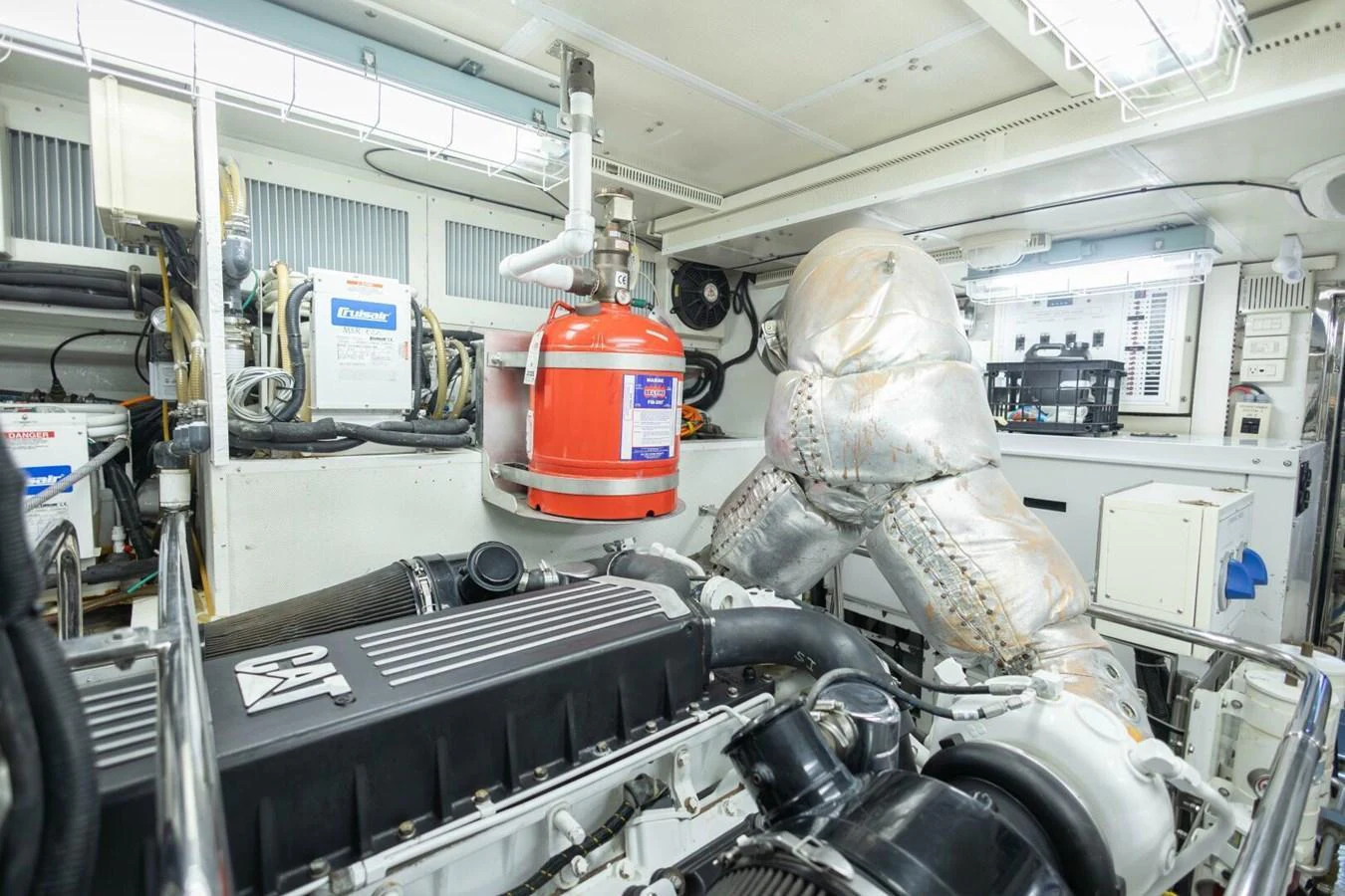 The image showcases the well-maintained engine room of the yacht, highlighting its advanced machinery and equipment. aboard BOBBI TOO Yacht for Sale
