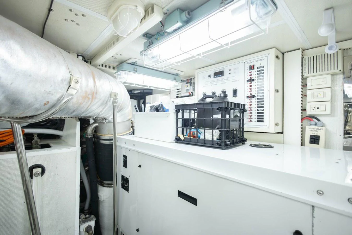 The image showcases the clean and well-organized engine room of the yacht, highlighting its technical equipment and systems. aboard BOBBI TOO Yacht for Sale