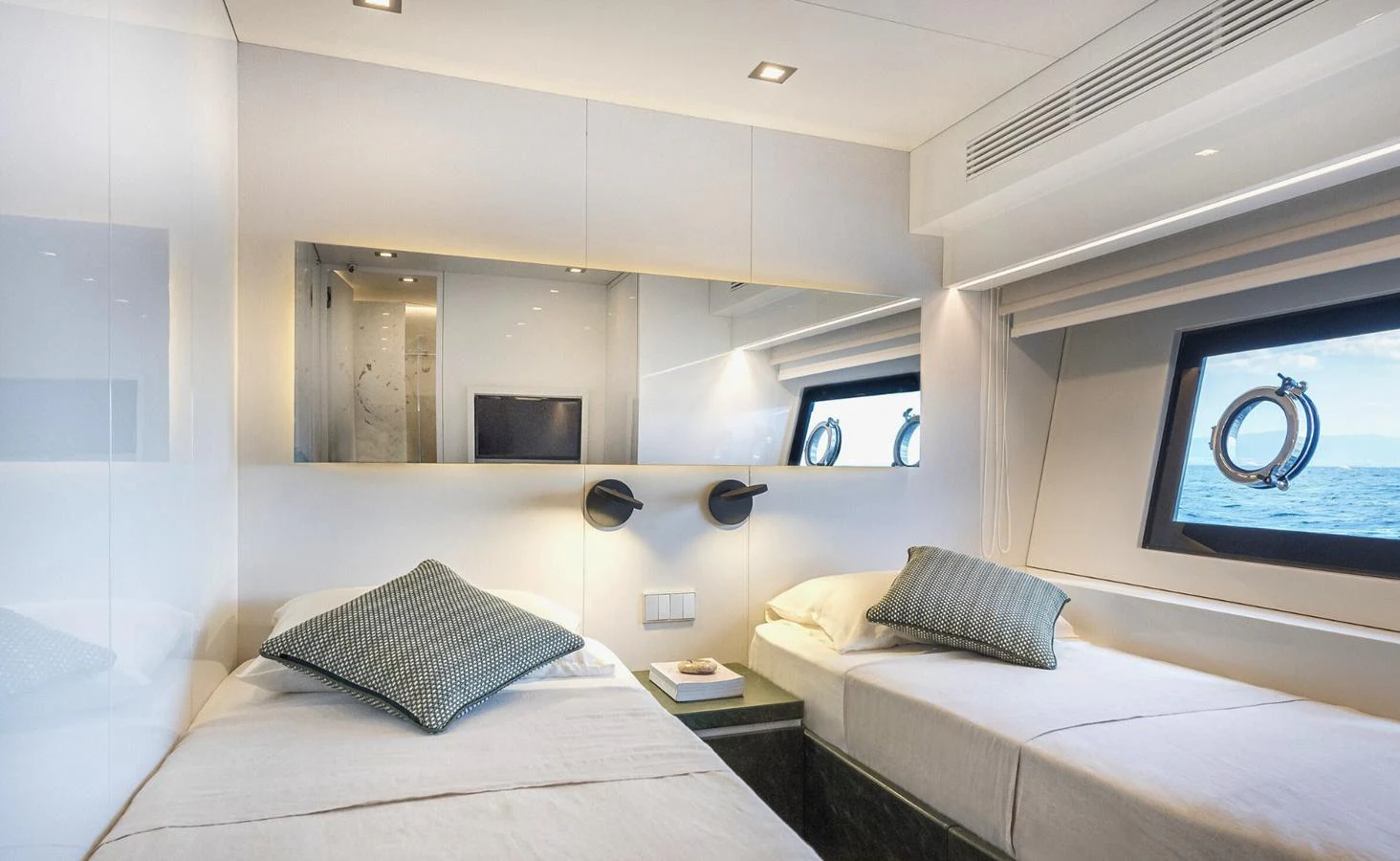 a room with two beds aboard ATLASS Yacht for Sale