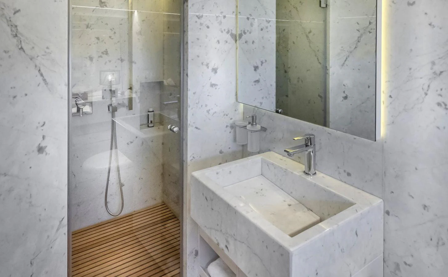 a bathroom with two sinks aboard ATLASS Yacht for Sale