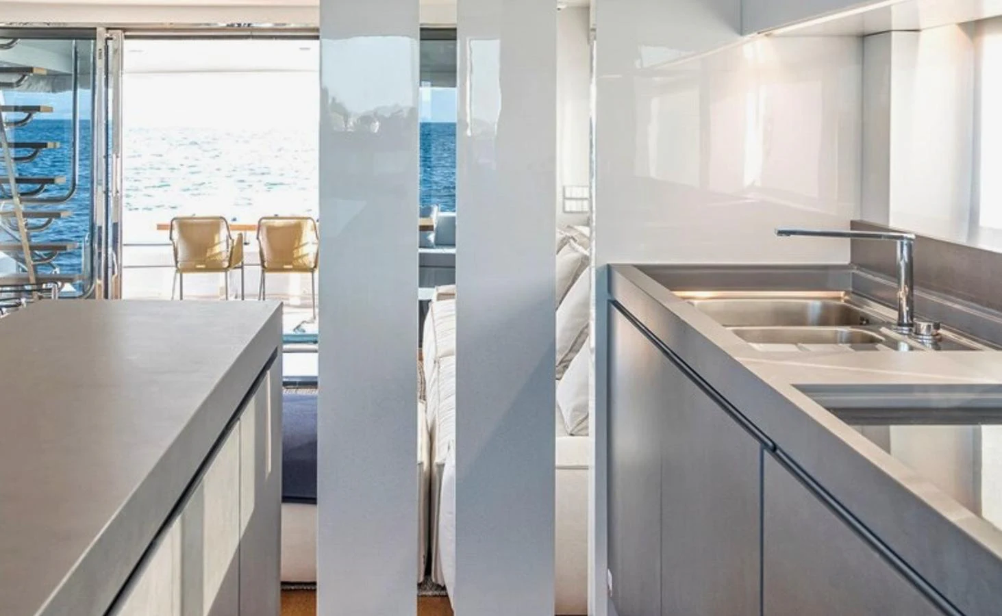 a kitchen with a sink and cabinets aboard ATLASS Yacht for Sale