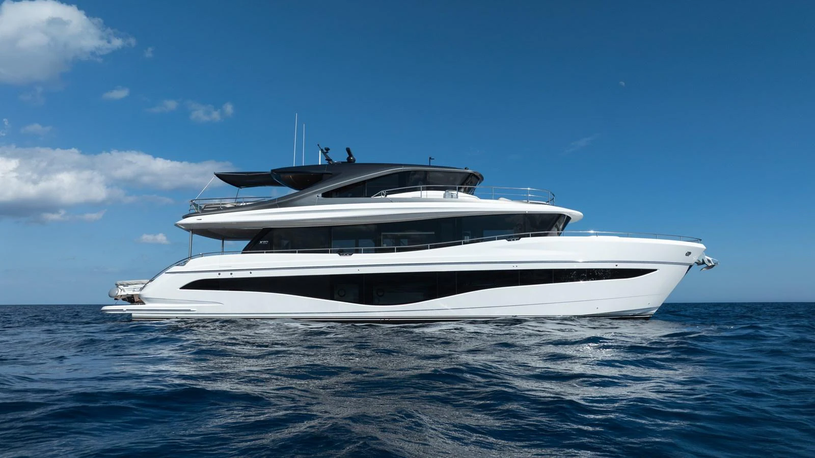 a white yacht in the water aboard MARAVI Yacht for Sale
