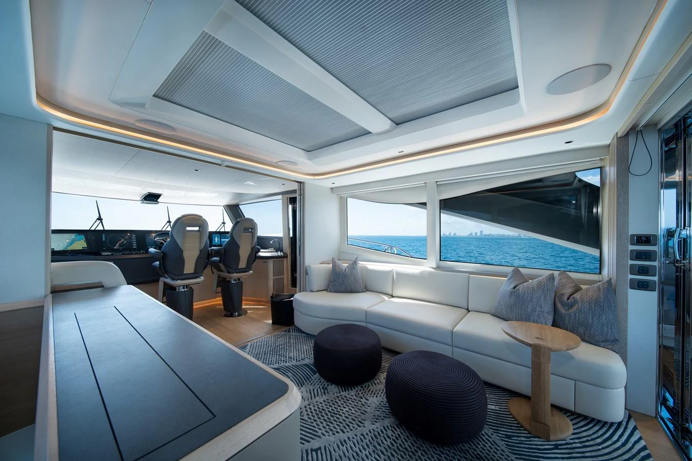 a room with a couch and a table aboard MARAVI Yacht for Sale