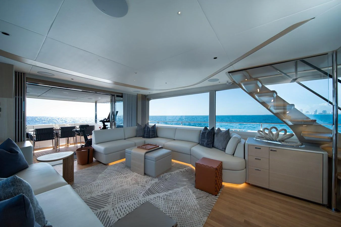 a living room with a large window aboard MARAVI Yacht for Sale
