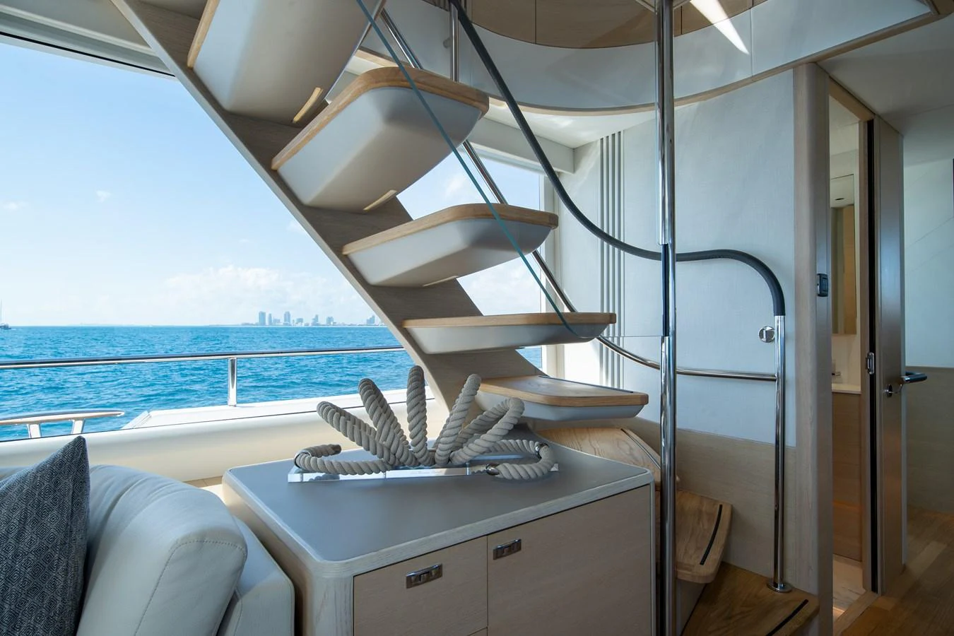 a room with a bed and a table aboard MARAVI Yacht for Sale