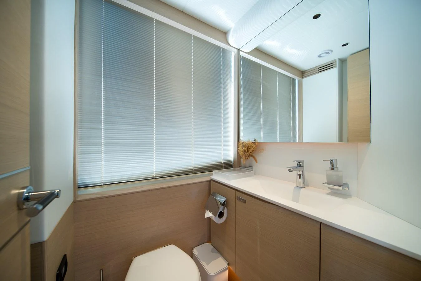 a bathroom with a sink and a toilet aboard MARAVI Yacht for Sale