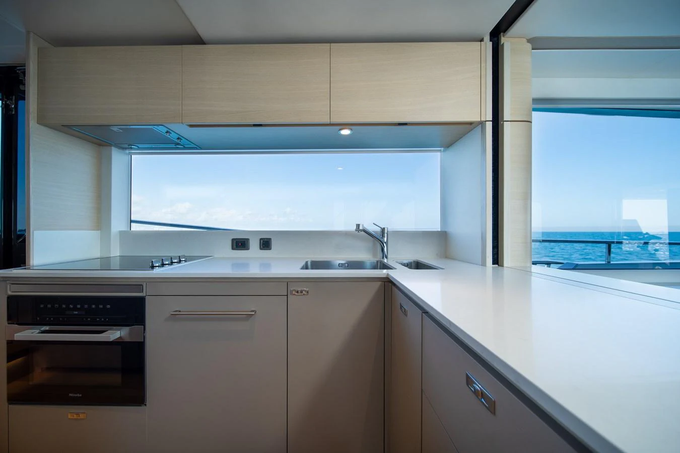 a kitchen with a window aboard MARAVI Yacht for Sale
