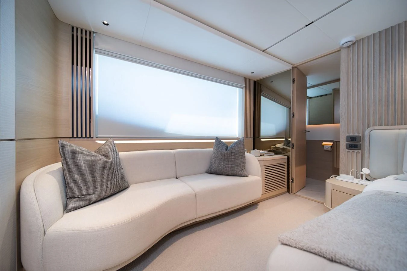 a room with a bed and a window aboard MARAVI Yacht for Sale