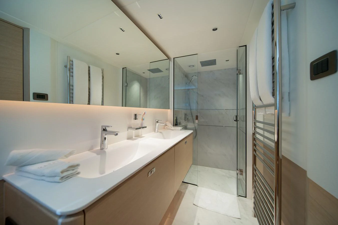 a bathroom with a sink and a mirror aboard MARAVI Yacht for Sale