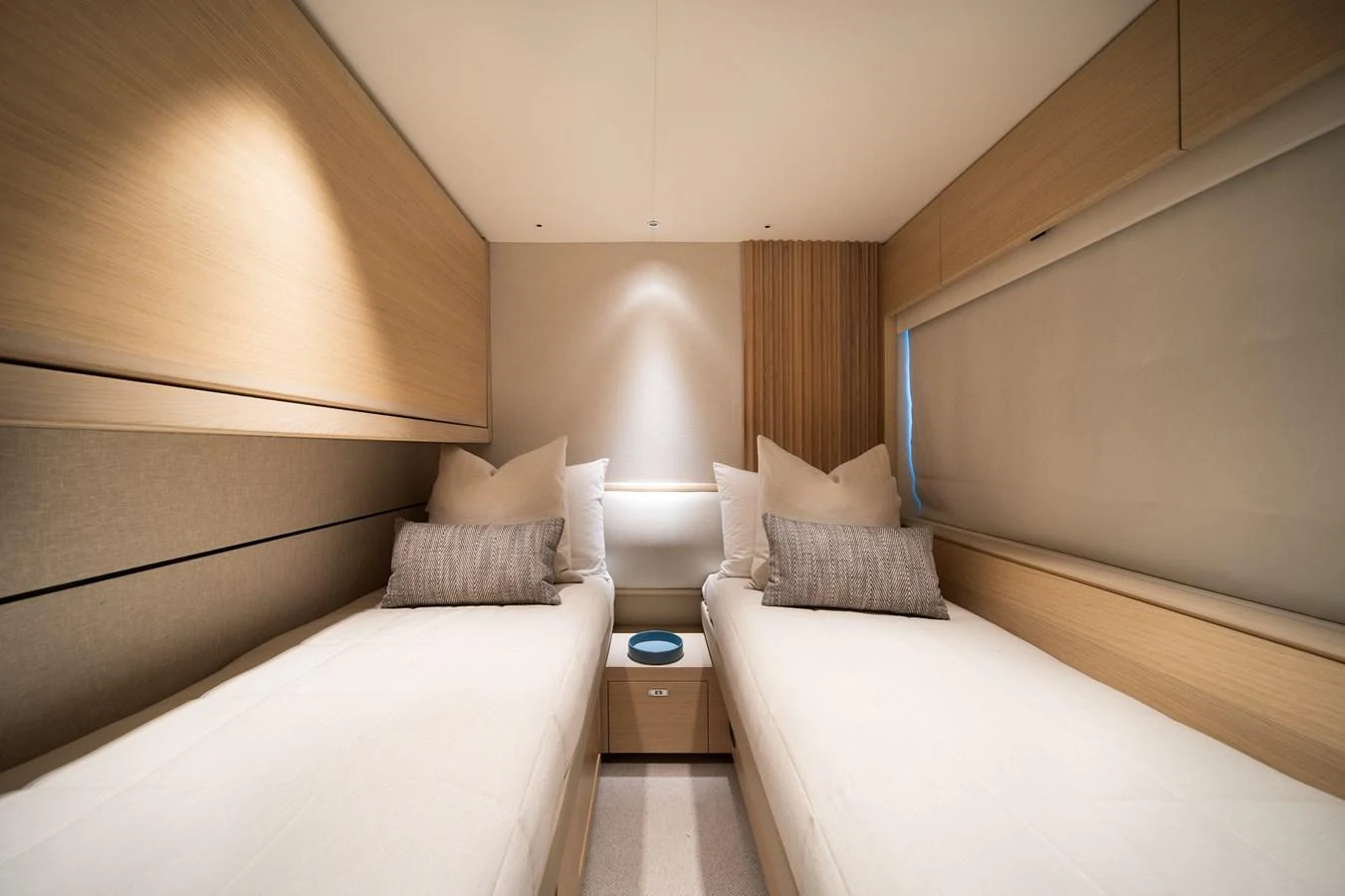 a room with two beds aboard MARAVI Yacht for Sale