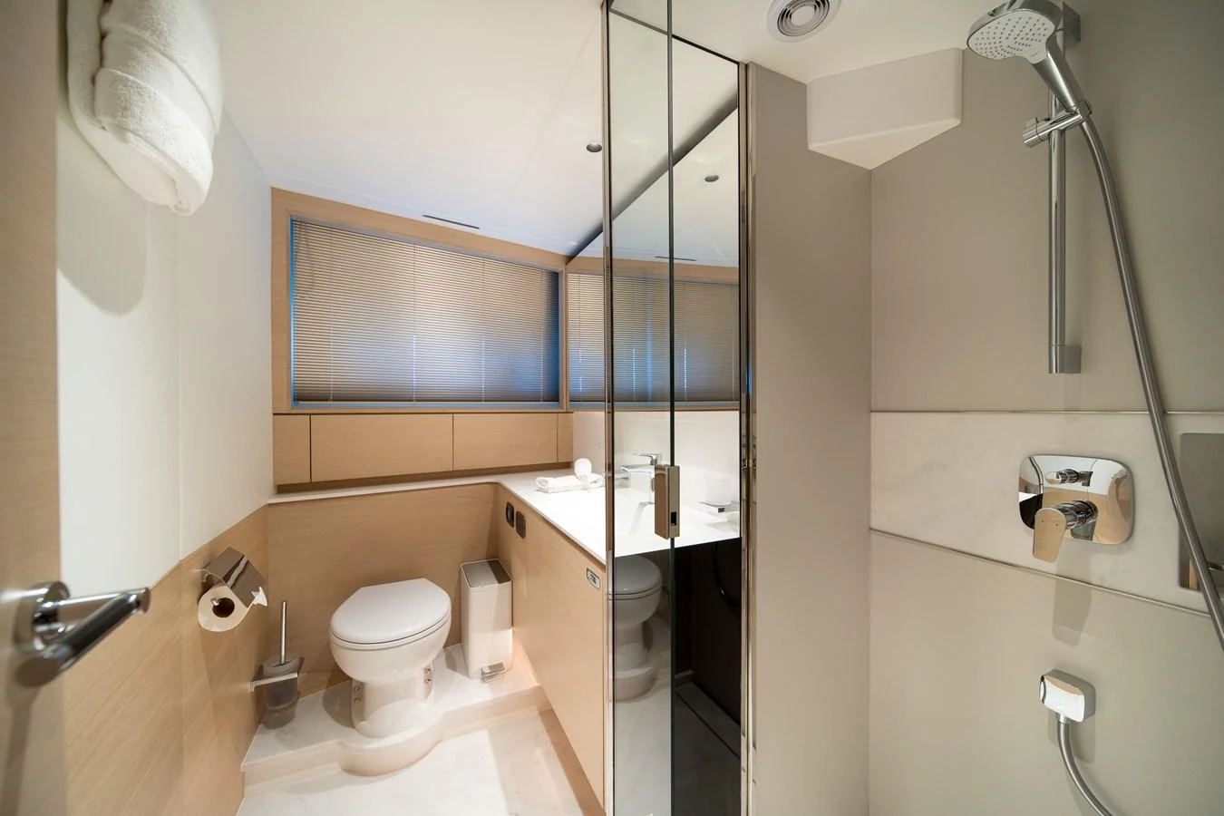 a bathroom with a shower and toilet aboard MARAVI Yacht for Sale