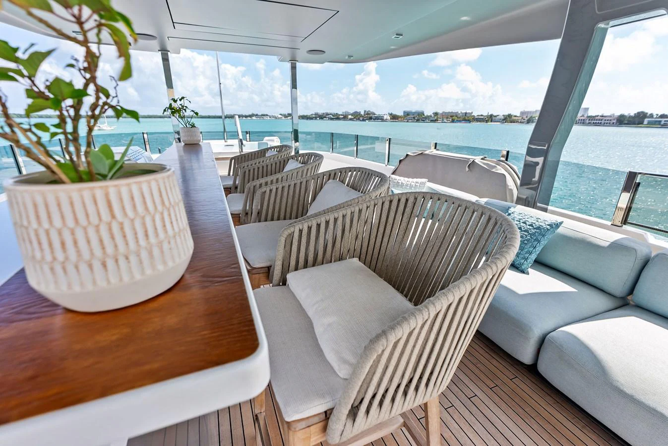 a table with chairs on it aboard LUMPASAURUS Yacht for Sale