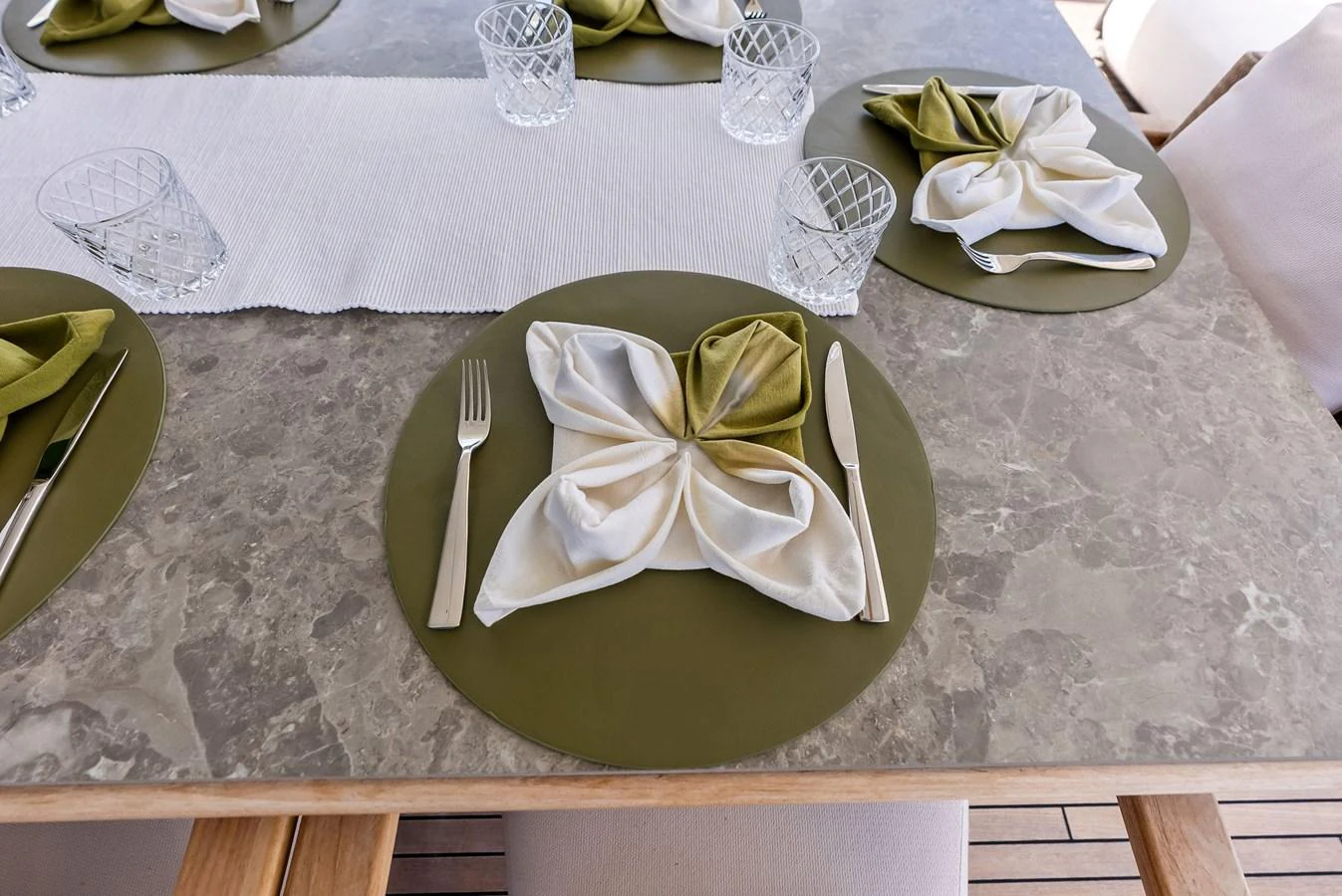 a plate with a flower on it aboard LUMPASAURUS Yacht for Sale
