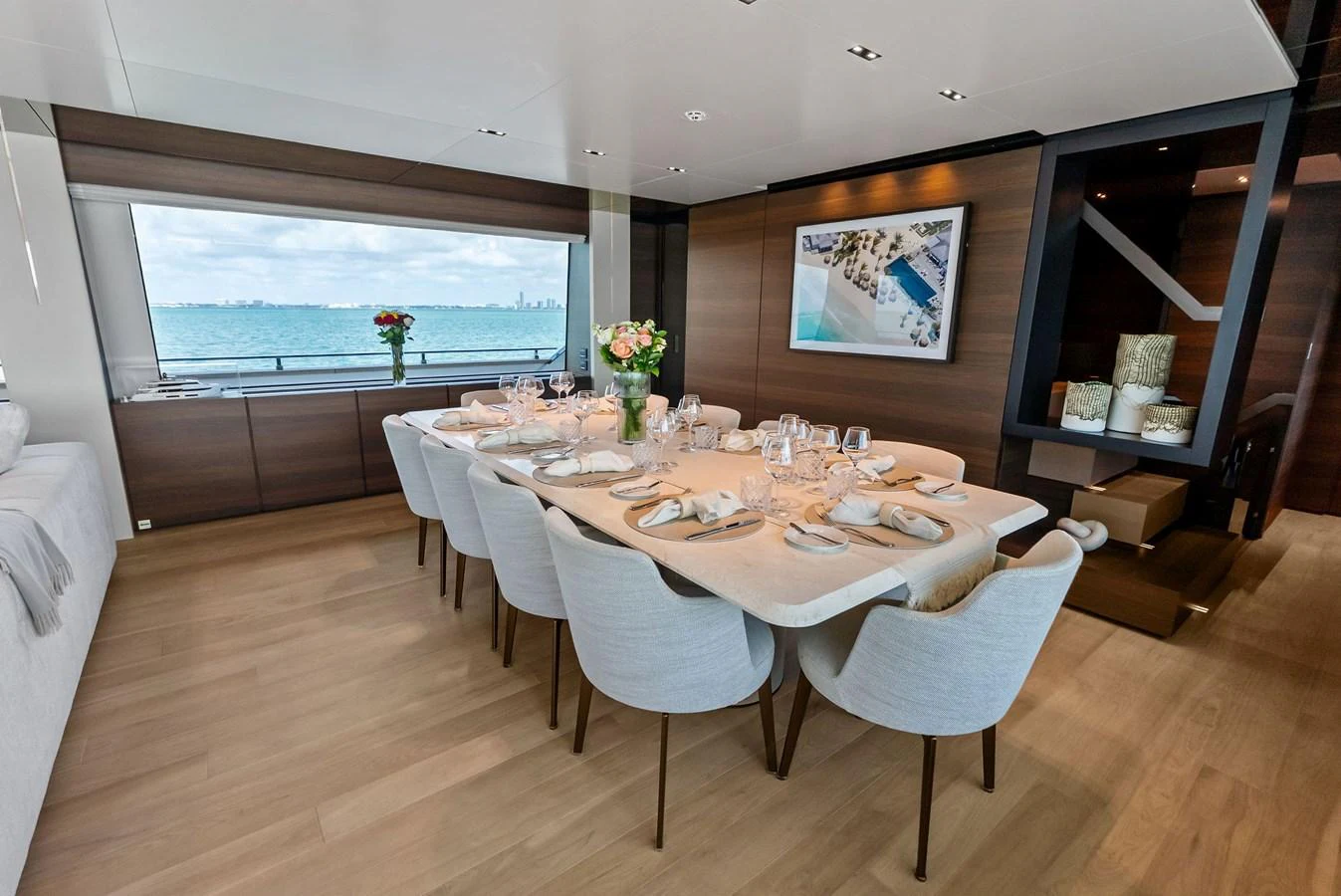 a dining table set for a meal aboard LUMPASAURUS Yacht for Sale