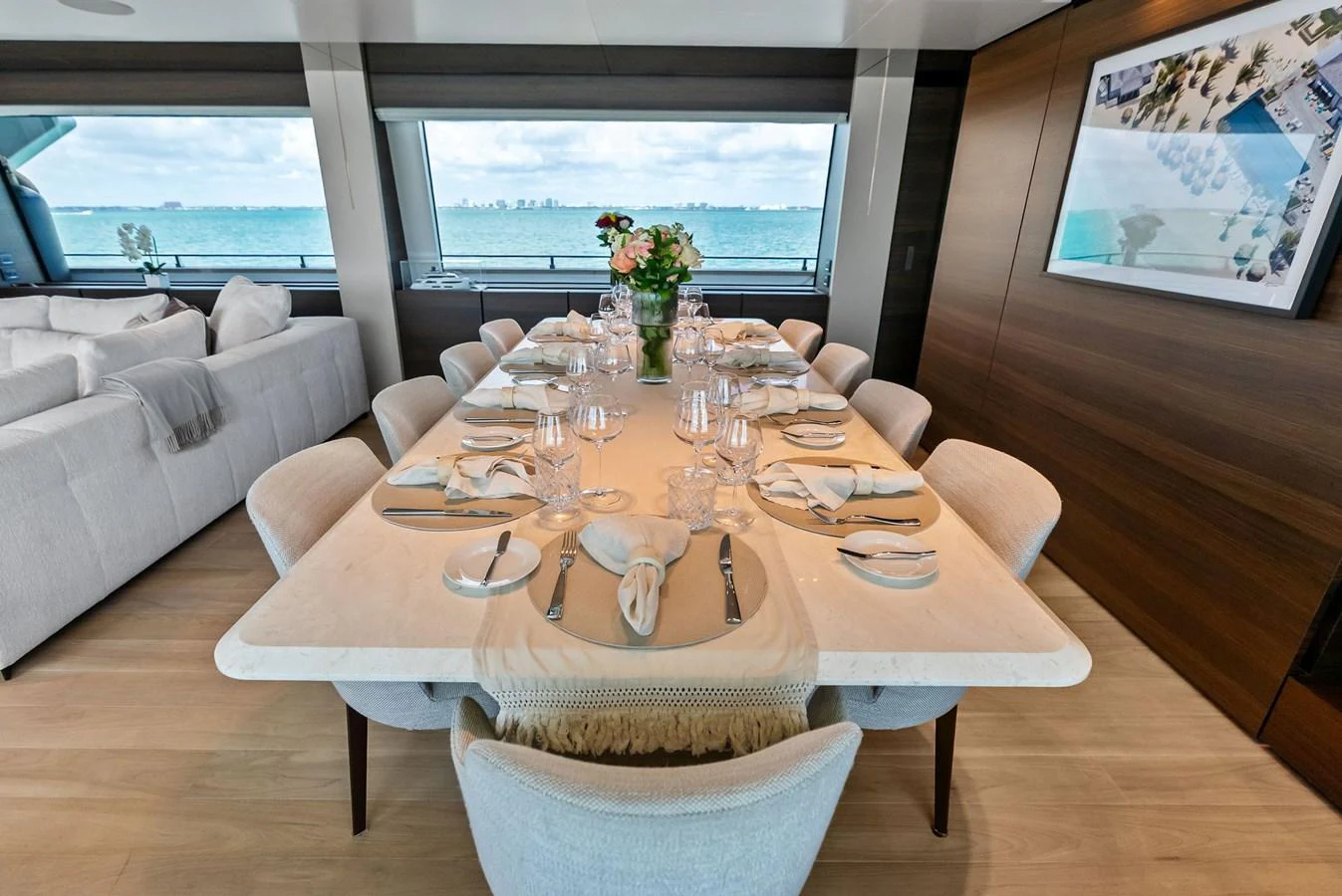 a table set with plates and glasses aboard LUMPASAURUS Yacht for Sale