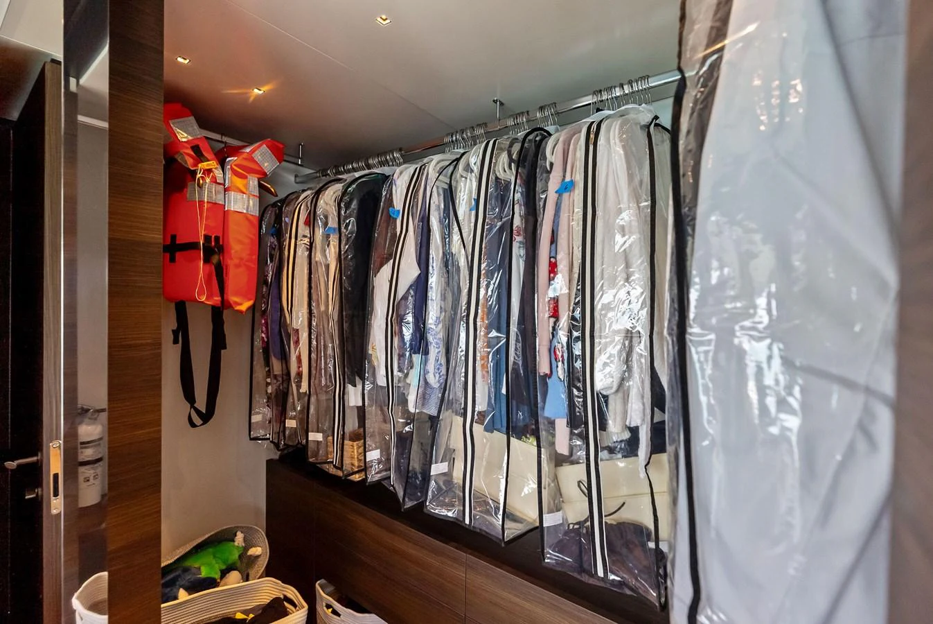a closet full of clothes aboard LUMPASAURUS Yacht for Sale