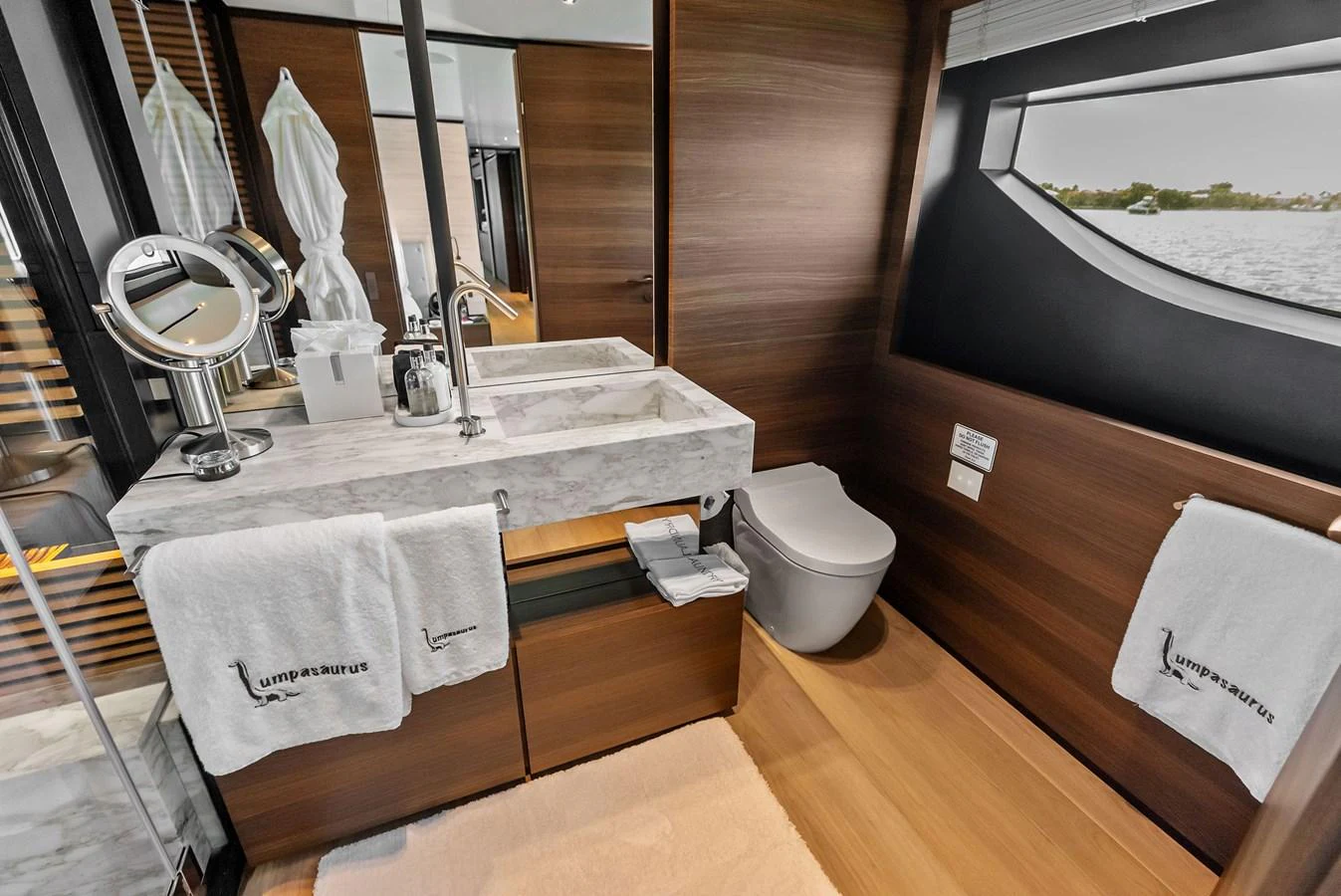a bathroom with a large sink aboard LUMPASAURUS Yacht for Sale