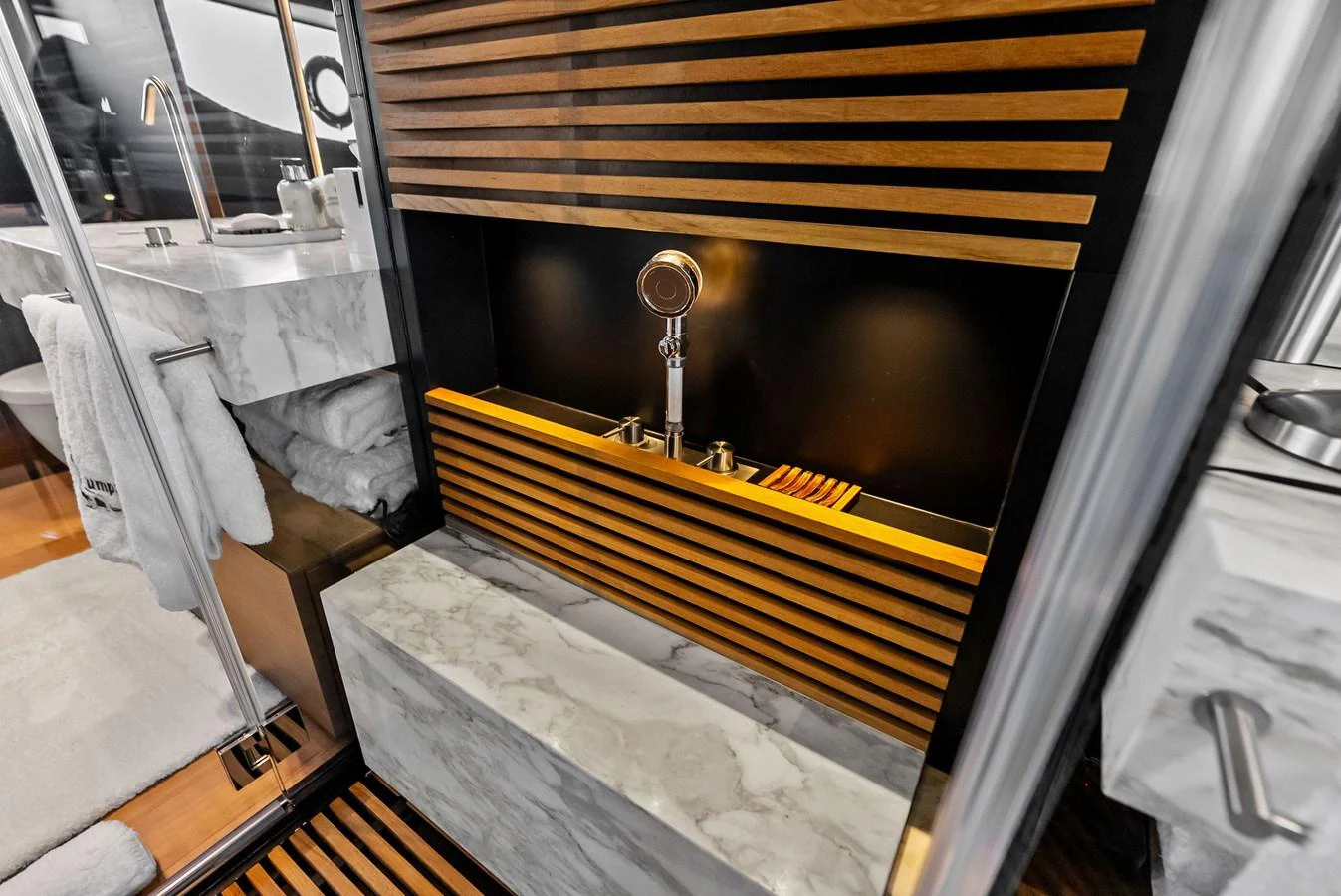 a bathroom with a sink and a bathtub aboard LUMPASAURUS Yacht for Sale